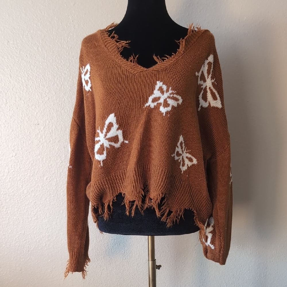 Frayed V-Neck Sweater with Butterfly Design